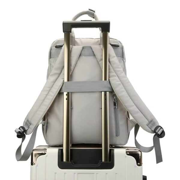 Pañalera Mochila Donna 223 Rosado Creciendo Juntos uso