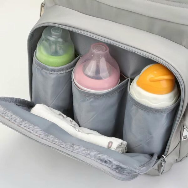 Pañalera Mochila Donna 223 Rosado Creciendo Juntos biberón