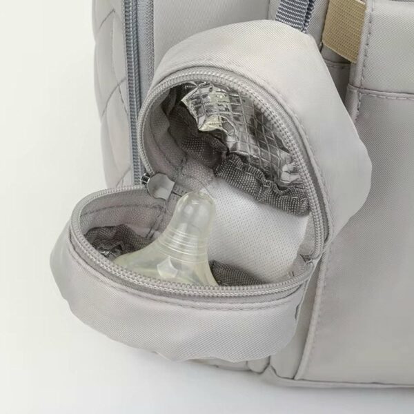 Pañalera Mochila Donna 223 Celeste Creciendo Juntos bolsillo