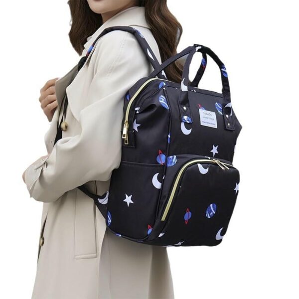 Mochila Pañalera Negra Espacio Prime uso