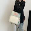 Mochila Rabbit 1358 Turquesa Creciendo Juntos uso